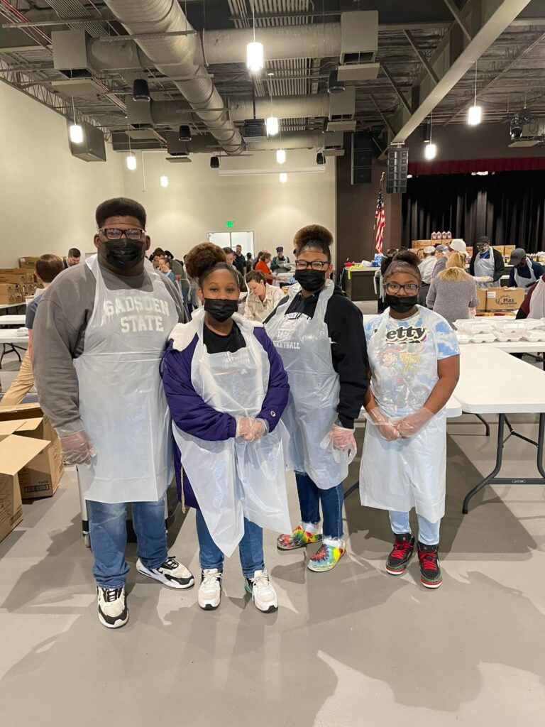Four volunteers at the 2021 Thanksgiving Community Event